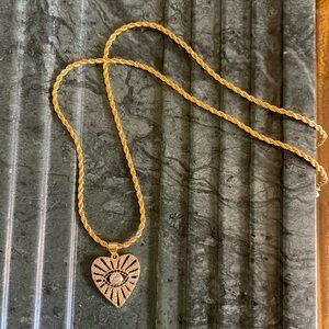 HRH COLLECTION “WATCHFUL EYE” CHARM WITH GOLD TONE CHAIN